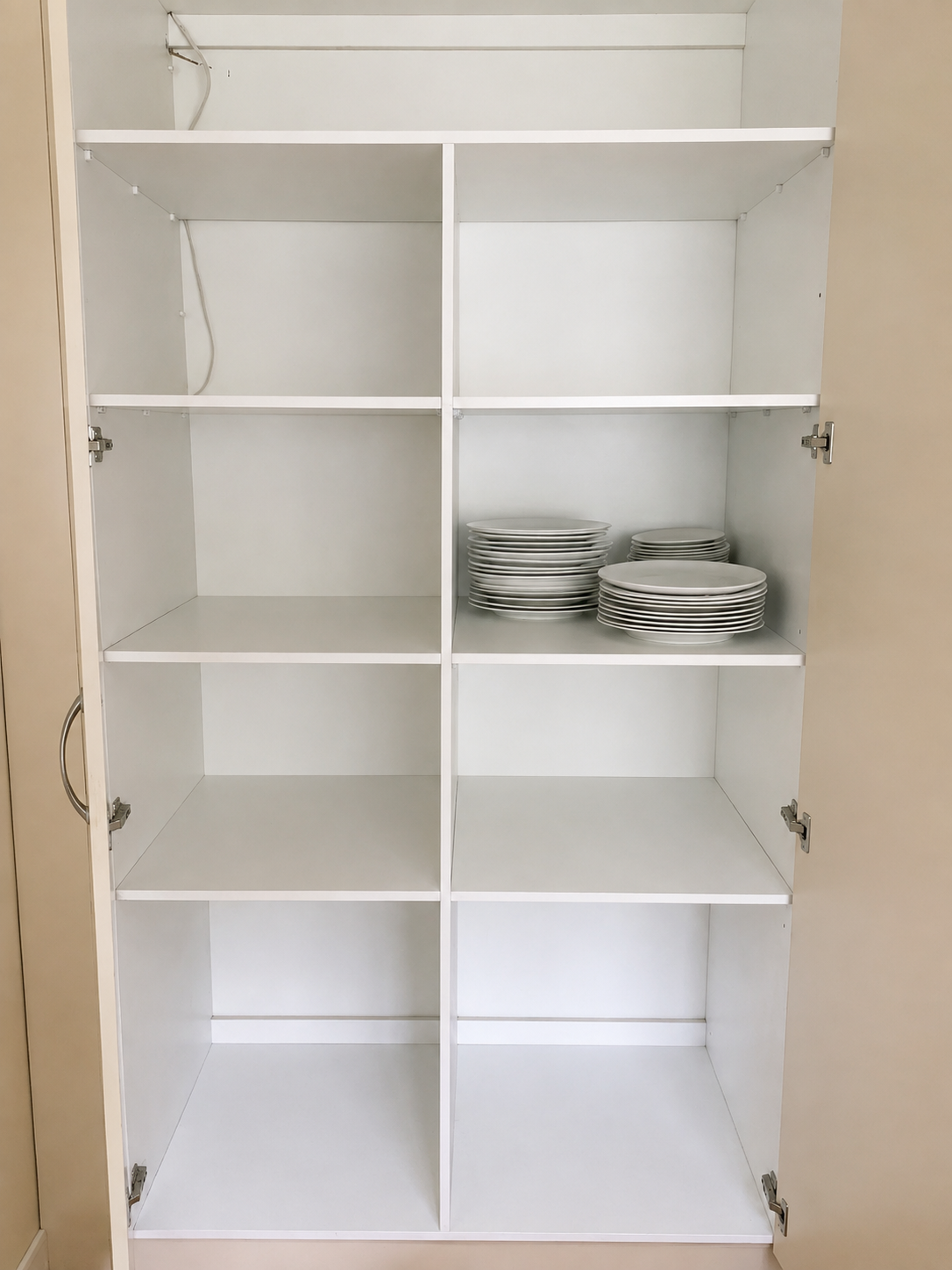Finished built-in cupboard interior shelving